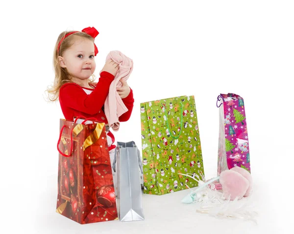Criança Bonita Feliz Com Sacos Compras Senta Fundo Branco Anos — Fotografia de Stock