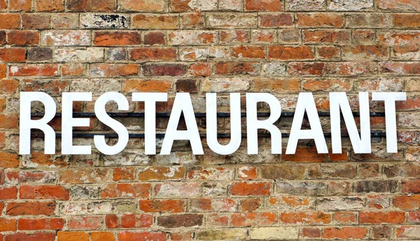 Restaurant Schild Auf Hauswand — Stockfoto