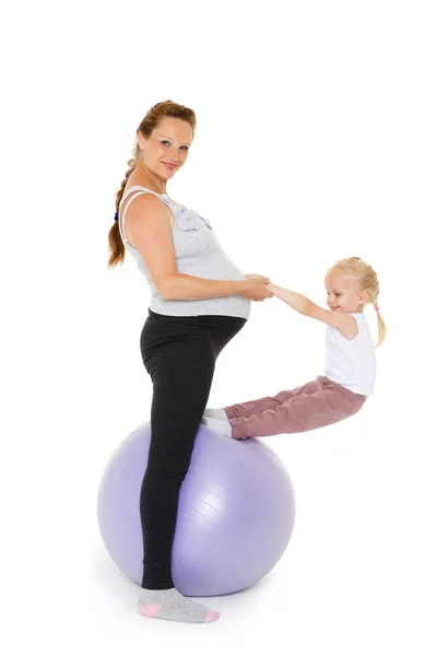 Young Pregnant Woman Small Daughter Fitness Ball White Background Healthy — Stock Photo, Image