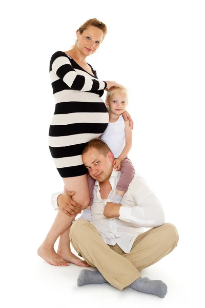 Gravid Kvinna Hennes Man Och Vackra Dotter Vit Bakgrund Lycklig — Stockfoto
