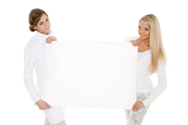 Two Young Pretty Women Winter Clothes Empty Board Text White Stock Picture