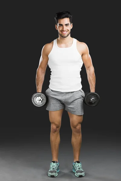 Portrait Handsome Young Man Lifting Weights Isolated Gray Background — Stock Photo, Image