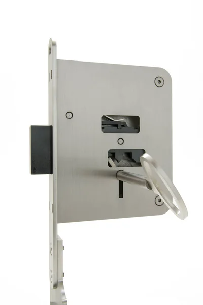 基本门锁在锁定位置的视图 内部机构通过开口是可见的 带有插入键的示例 — 图库照片
