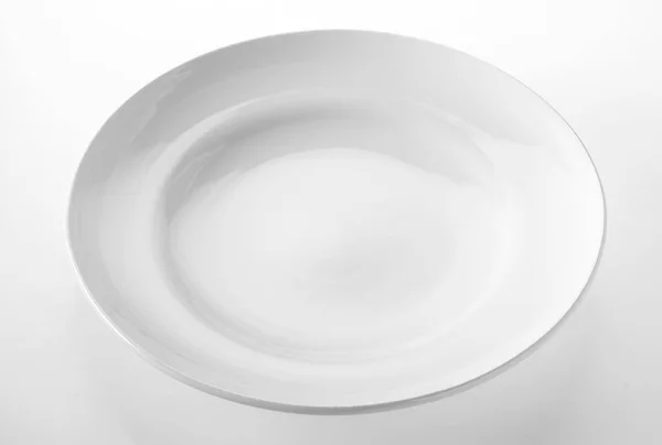 Close Empty Glossy White Porcelain Plate Simple Design White Table — Stock Photo, Image