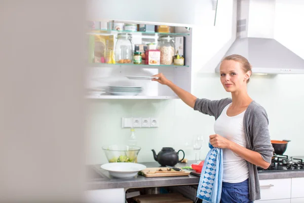 Young Woman Washing Dishes Her Modern Kitchen Using Dishwasher Putting Stock Picture