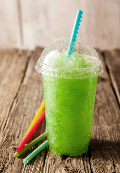 Close Still Life Plastic Cup Filled Refreshing Frozen Green Slush — Stock Photo, Image