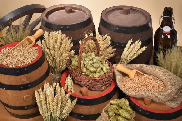 beer kegs,beer bottle,hammer and tap with wheat,barley,hops and malt\n