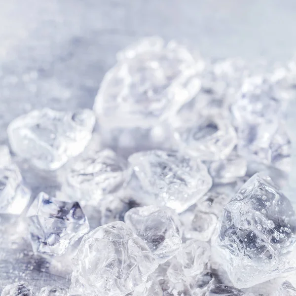 Close up texture of crushed ice cubes ready for making delicious refreshing granita slush drinks in summer