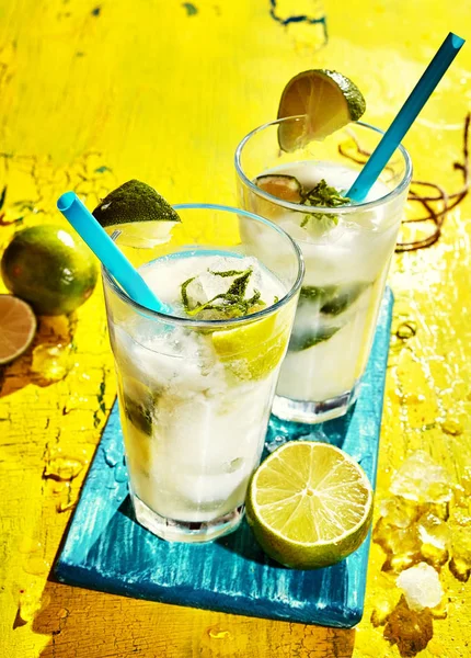 Close Pair Brazilian Caipirinha Cocktails Made Fresh Lime Sugar Cachaca — Zdjęcie stockowe