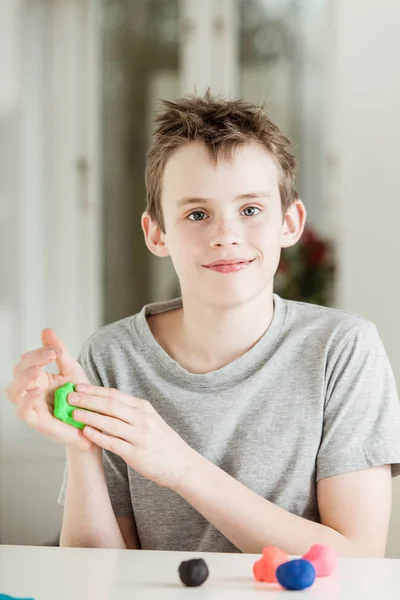 Single Grinning Young Boy Gray Short Sleeve Shirt Working Green — Stock Photo, Image