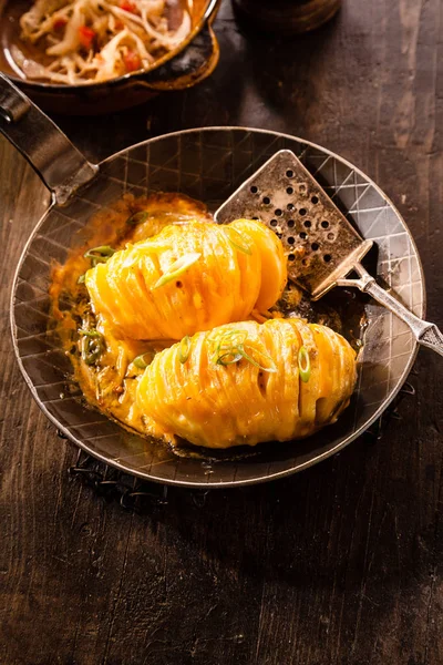 Two Baked Potatoes Sliced Topped Melted Cheese Served Pan Vintage — Stock Photo, Image