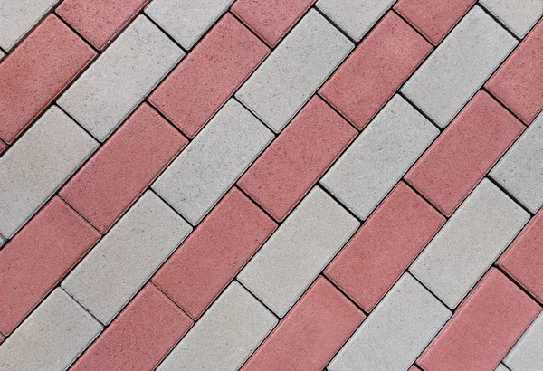 赤と灰色の舗装石の行の図パターン — ストック写真