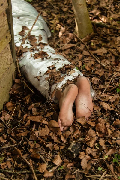 Wrapped Barefoot Corpse Lying Woods Concealed Wooden Shed Dried Autumn — Stock Photo, Image