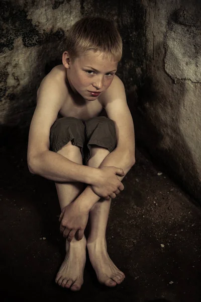 Sad Single Imprisoned Male Child Wearing Shorts Sitting Dirty Floor — Stock Photo, Image