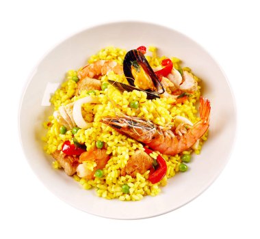 High Angle Still Life View of Traditional Spanish Paella Dish Made with Yellow Saffron Rice and Fresh Seafood and Shellfish Served in Modern White Bowl on White Background clipart