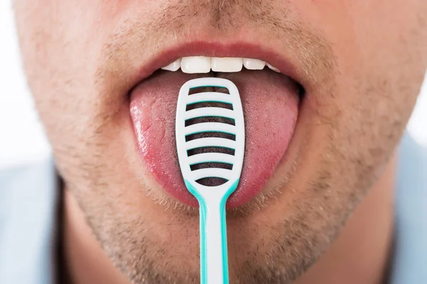 Close Young Man Cleaning His Tongue Scraper — Stock Photo, Image