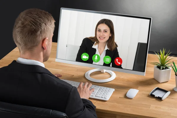 Young Businessman Video Conferencing Colleague Laptop Desk Office — Stock Photo, Image