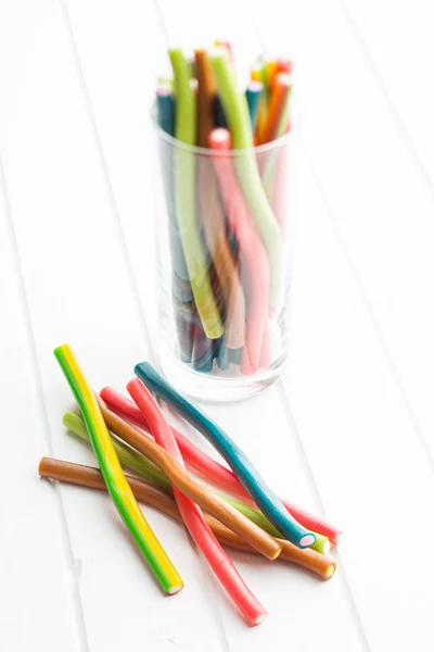 Sweet Gummy Sticks Different Flavor Tasty Candies Isolated White Table — Stock Photo, Image