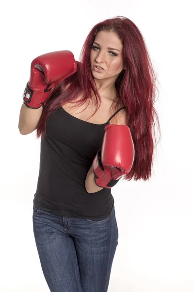 Red Haired Young Woman Wearing Boxing Gloves Stock Image