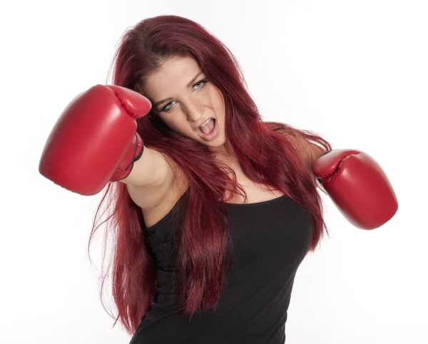 Red Haired Young Woman Wearing Boxing Gloves Royalty Free Stock Photos