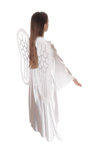 天使穿着长长的白色撒旦衣服 长着翅膀和棕色的长发 站在侧面 胳膊朝下 与白色背景隔离 — 图库照片