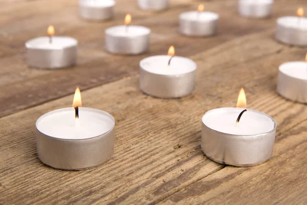 White Candles Front Wooden Background — Stock Photo, Image