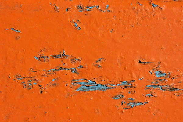 Gebarsten Oranje Verf Met Blauwe Achtergrond — Stockfoto