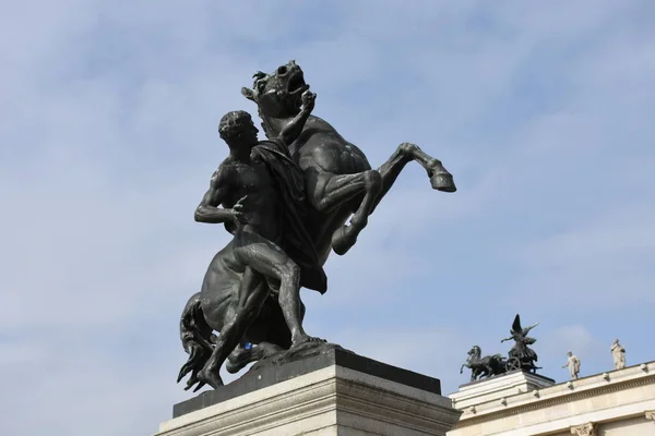 equestrian statues,statues,bronze statues,bronze statue,bronze,parliament vienna,roof,socrates