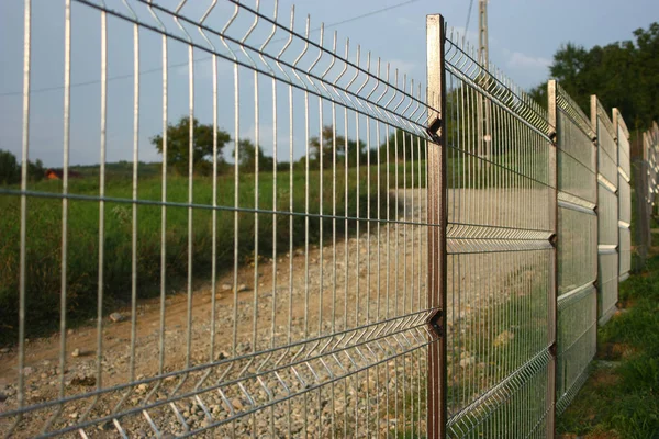 fence with barbed wire