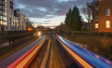 Early evening fast trains, Clapham, London, United Kingdom clipart