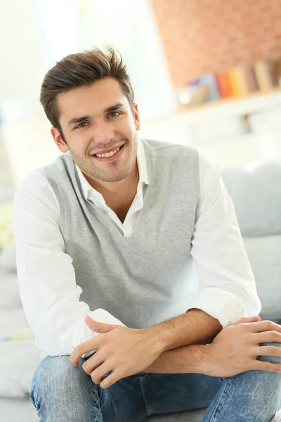 Portrait Smiling Casual Guy Sitting Sofa Royalty Free Stock Photos