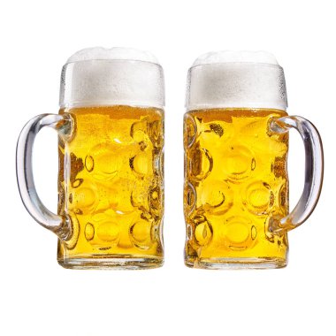 Two glass tankards of chilled beer with a good frothy head side by side with the handles in opposite directions isolated on white conceptual of the Oktoberfest clipart