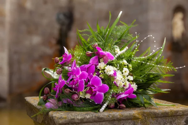 wedding bridal bouquet of purple flowers