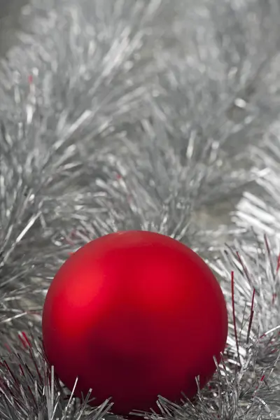 Red Christmas Ball Silver Tinsel Stock Image