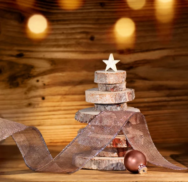 christmas card - christmas greetings motif with a christmas tree made of wood