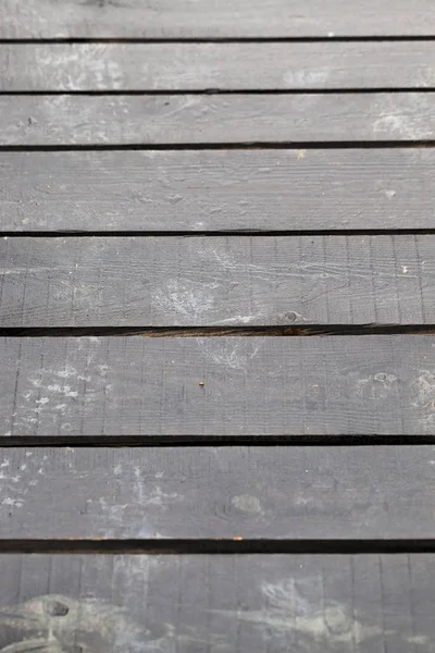 Gefotografeerd Close Deel Van Muur Gemaakt Van Planken Zwart Nat — Stockfoto