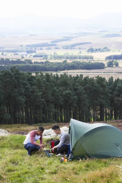Two Young Men Camping Trip Countryside Stock Photo