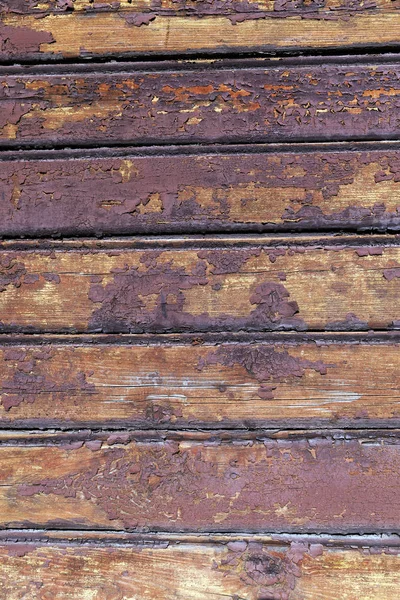 Fotografado Close Antiga Parede Madeira Com Tinta Vermelha Descascada — Fotografia de Stock