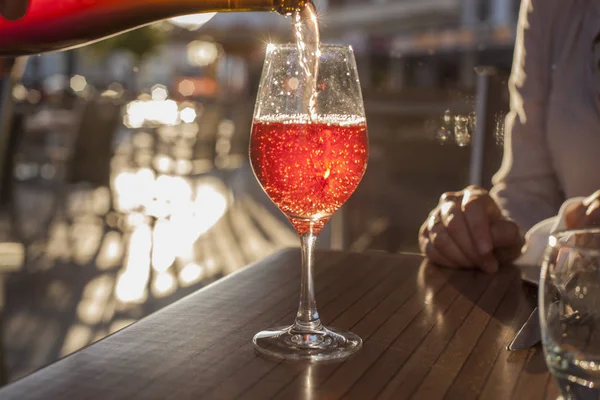 Wine being poured into wine glass