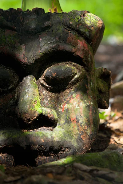 Ancient ruined statue at Ekom waterfall in the Littoral region of Cameroon