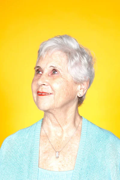 Senior Woman Looking Studio Shot — Stock fotografie