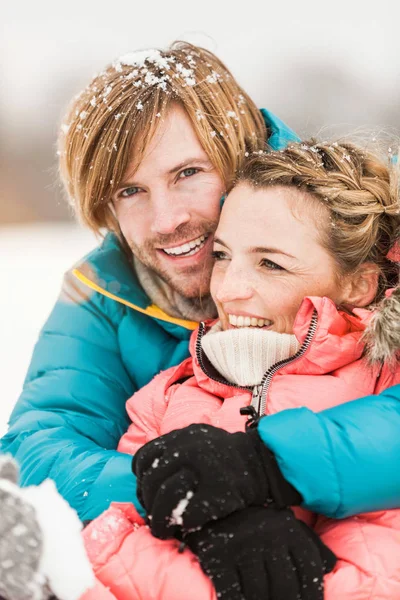 Mid Adult Couple Embracing Snow Hair Stock Picture