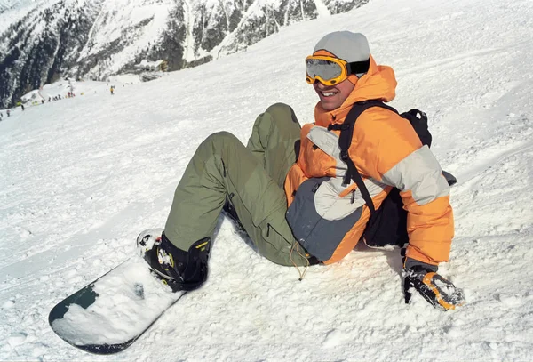 Boy Sitting Snow Snowboard Stock Image