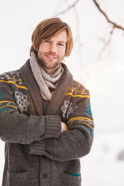 Portrait of man wearing knitted cardigan