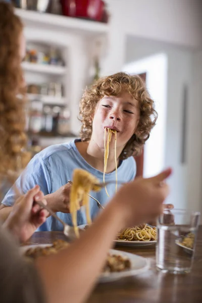 Teenage Boy Eating Spaghetti Dining Table — Stock Photo, Image