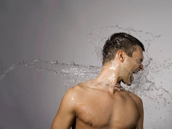 Man Splashed Water Stock Photo