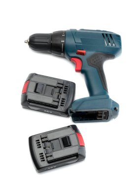 Electric screwdriver with two batteries. Isolate on white. clipart