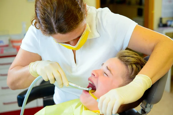 Teenager Treated Female Dentist Dental Surgery — Stock Photo, Image