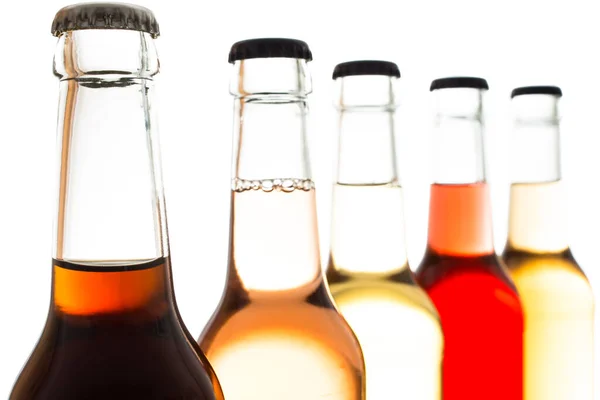 Cola Und Limonade Flaschen Mit Kronkorken Gegenlicht — Stockfoto