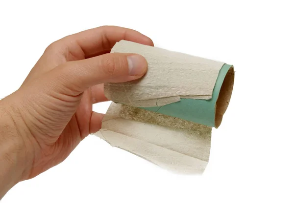 Ręka Trzyma Rdzeń Papieru Toaletowego Białym Tle — Zdjęcie stockowe